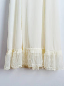 Vintage white lace slip with pleated flounce