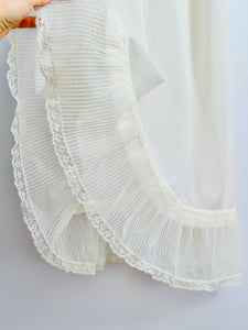 Vintage white lace slip with pleated flounce