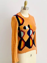 Load image into Gallery viewer, mannequin display a vintage orange color sweater with art deco pattern
