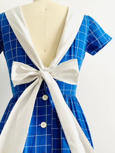 Vintage 1940s navy blue plaid dress with oversized ribbon bow