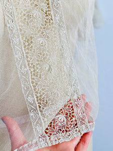 close up of a vintage 1920s chemical lace top 
