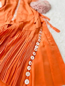 Vintage 1920s orange flapper dress