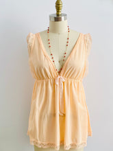 Load image into Gallery viewer, 1960s peach color lace ribbon lingerie top on mannequin
