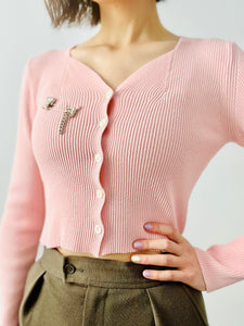 Pastel pink knit cropped top