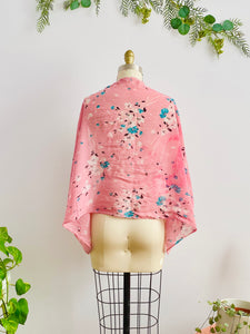 back of a vintage 1930s pink floral silk scarf display on mannequin