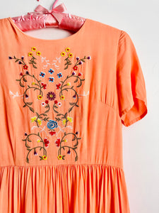 1950s style orange embroidered dress