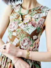 Load image into Gallery viewer, Safari floral print rayon mini dress
