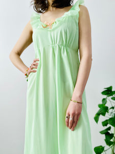 Vintage 1960s pastel green lingerie slip dress with ribbon