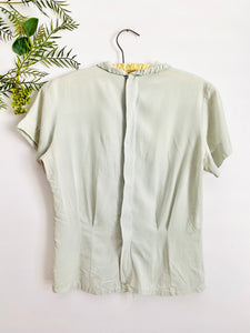 Vintage 1940s icy blue rayon top with ruched collar