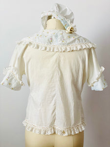 Vintage 1920s embroidered bed jacket with matching bonnet