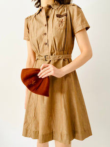 Vintage 1940s Girl Scouts uniform with beret