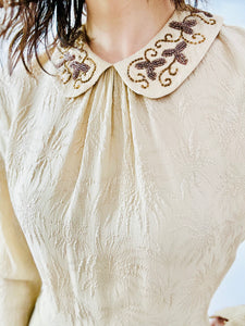 Vintage 1940s beige beaded crepe dress