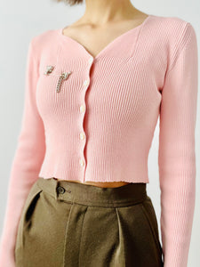 Pastel pink knit cropped top
