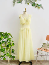 Load image into Gallery viewer, 1960s Yellow sheer lingerie gown with embroidered flowers on mannequin
