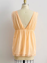 Load image into Gallery viewer, back view of a 1960s peach color lace ribbon lingerie top on mannequin
