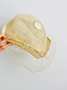 Vintage cream color fascinator with veil