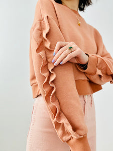Peach color ruffled pullover top