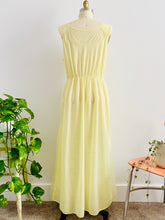 Load image into Gallery viewer, back of a 1960s Yellow sheer lingerie gown with embroidered flowers on mannequin
