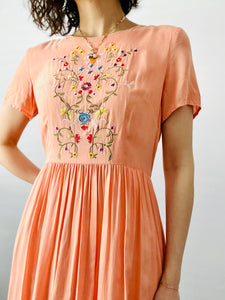 1950s style orange embroidered dress