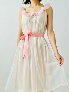 Vintage 1960s pastel pink lingerie slip