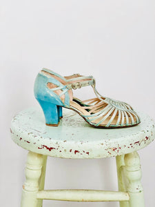 side of of 1920s pastel blue sandals 