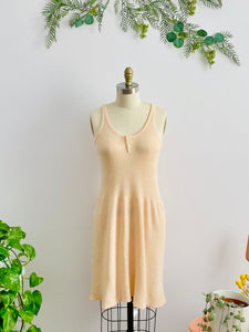 1920s peach color wool slip dress on mannequin