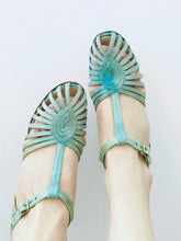 Load image into Gallery viewer, 1920s Turquoise color satin heels on model 
