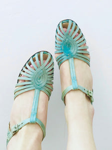 1920s Turquoise color satin heels on model 