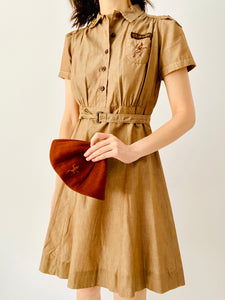 Vintage 1940s Girl Scouts uniform with beret