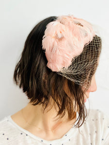 Vintage pink feather fascinator with veil bridal headpiece