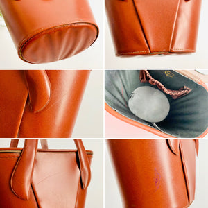 Vintage 1940s faux leather bucket bag with mirror