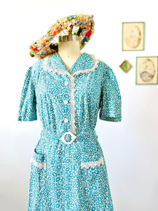 Vintage 1940s blue floral dress with belt