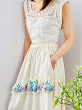 Load image into Gallery viewer, model wearing 1910s lace top and embroidered floral white skirt 
