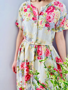 Vintage floral cotton dress with belt on model
