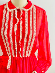 vintage 1970s red lace dress with peter pan collar on mannequin