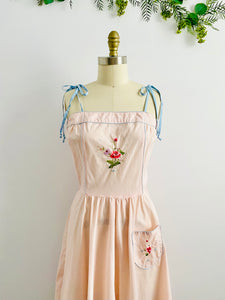 Vintage 1950s pastel pink cotton dress with embroidery
