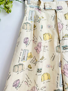 Vintage “travel essentials” novelty print linen shorts