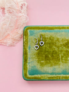Dainty heart shaped diamond earrings