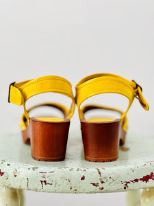 Yellow clog style sandals