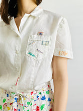 Load image into Gallery viewer, Vintage 1940s white cotton top with embroidered vintage labels
