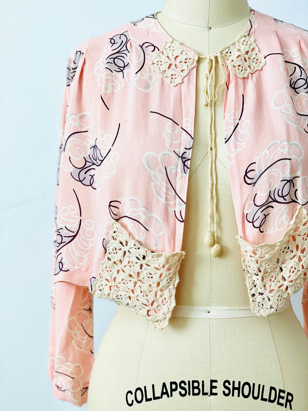 Vintage 1930s pink feather novelty print bed jacket