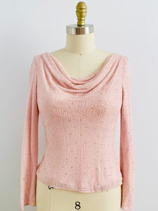 mannequin display a beaded vintage pink top with sequins