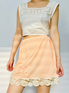 1910s lace top and peach color ribbon bow lace nylon skirt on model