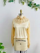 Load image into Gallery viewer, mannequin display a vintage beige color satin blouse with lace ruffled collar and balloon sleeves
