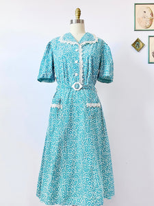 Vintage 1940s blue floral dress with belt