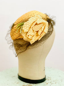 Vintage 1930s yellow millinery hat with veil