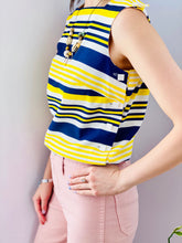 Load image into Gallery viewer, 1960s yellow and blue striped top with side square buttons on model

