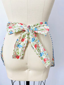 Vintage 1930s floral apron with ribbon bows