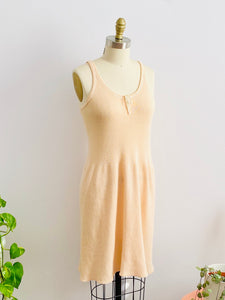 1920s peach color wool slip dress on mannequin
