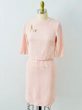 Load image into Gallery viewer, mannequin display a 1940s pink linen two piece set with flapper and dog brooch
